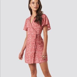 XLE Pink Bailee Short Sleeve Ruffle Hem Bailee Wrap Short Dress